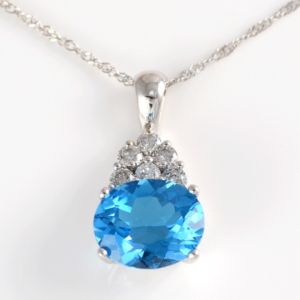 4.82 Carat Blue Topaz Pendant With Diamonds