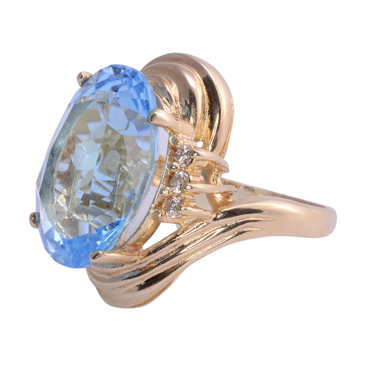 Oval Blue Topaz Diamond Ring