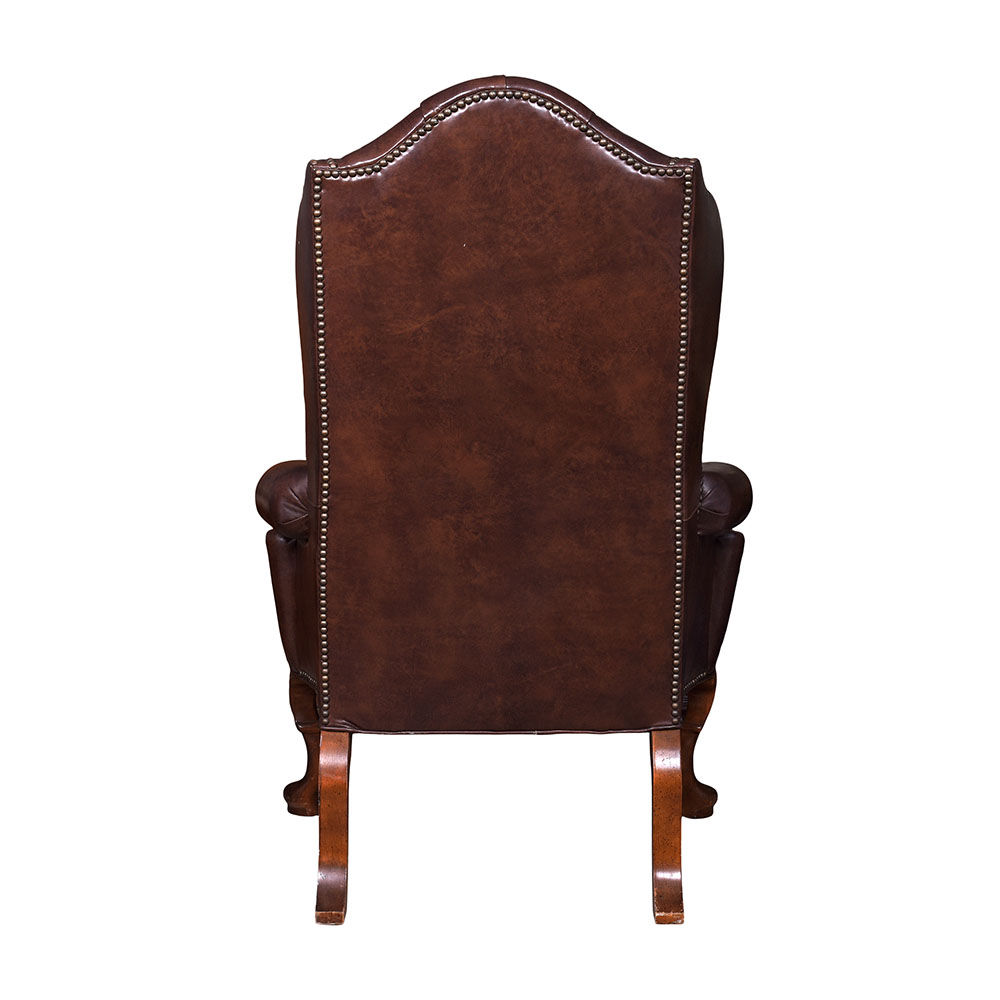 Pair of Tufted Leather Wing Back Chairs